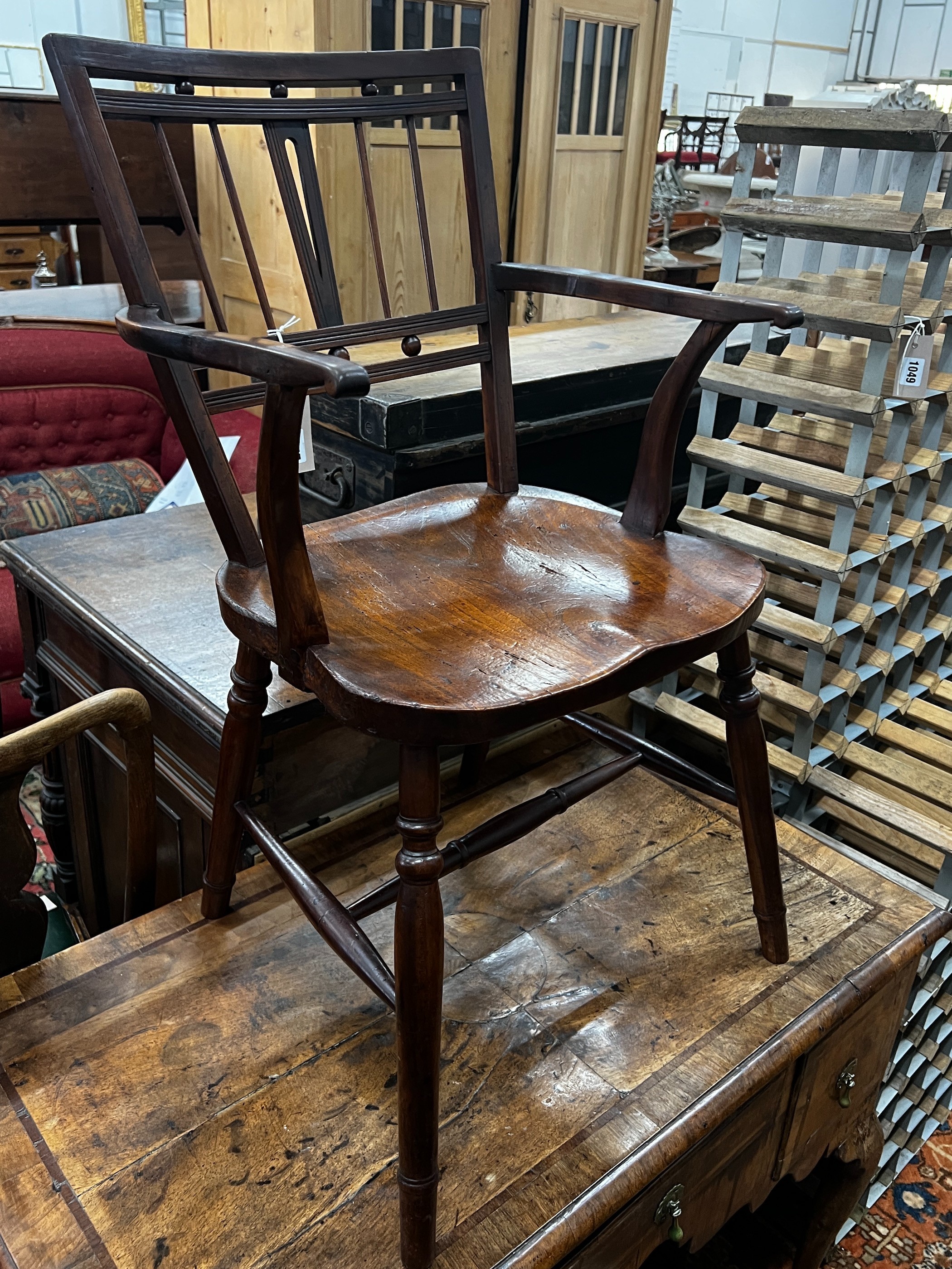 A mid 19th century elm and fruitwood Mendlesham elbow chair by Richard Day, width 48cm, depth 40cm, height 84cm